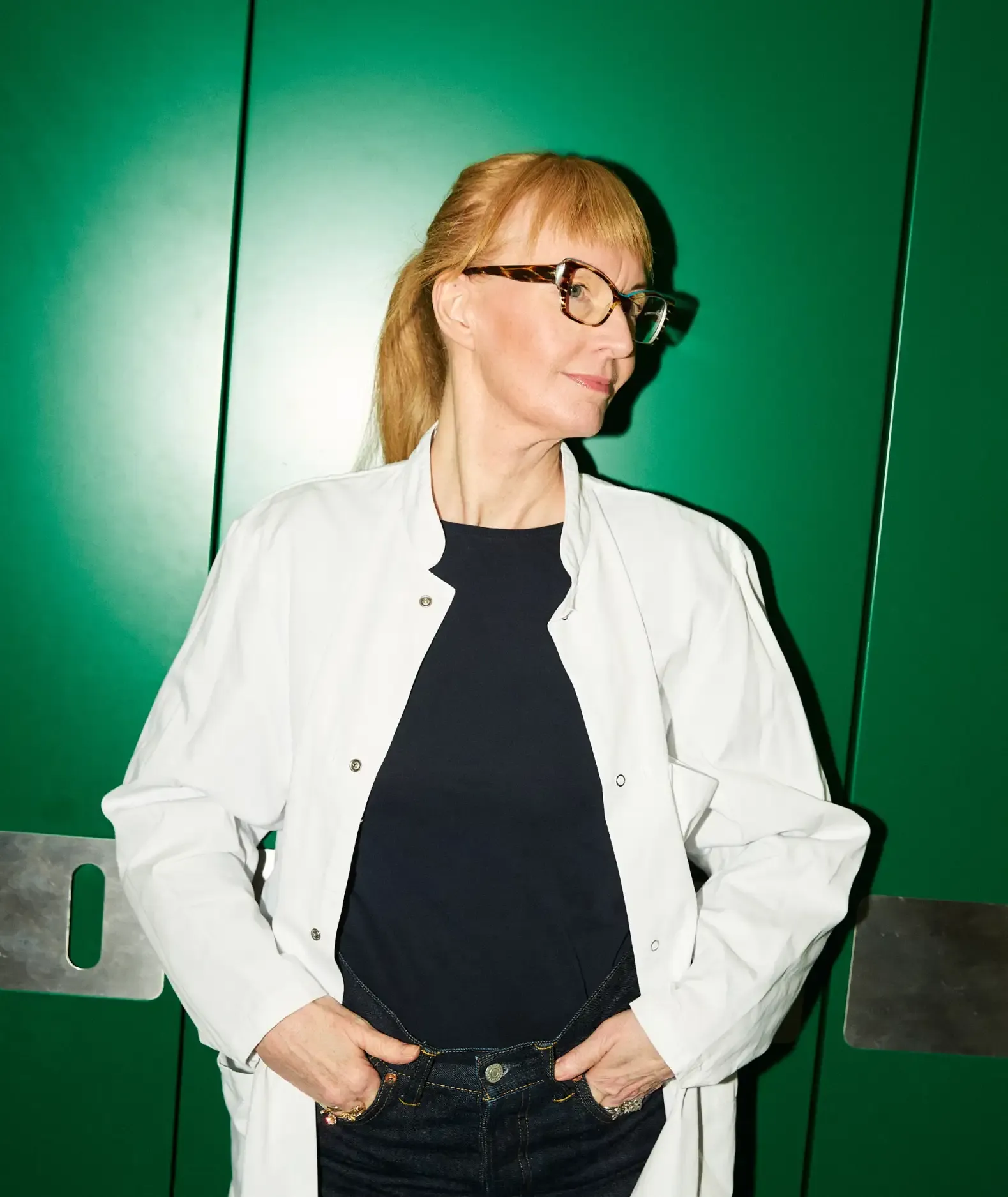 Lotte Bjerre Knudsen photographed against a green backdrop